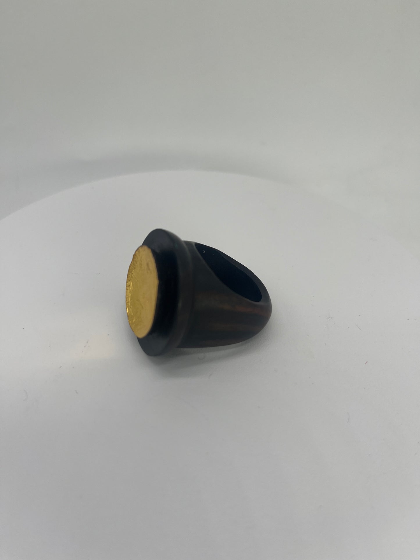 Handcrafted ebony wood ring large round sculpted 24k gold leafing accent